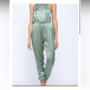 Boutique brand ‘FATE’. Size SMALL. Green jumpsuit.